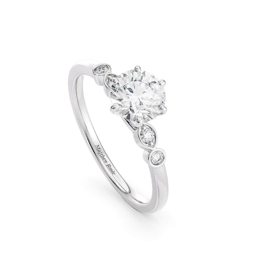 Marquise and Round Blossom Engagement Ring fine jewelry by Matthew Rosie