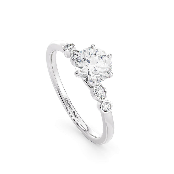 Marquise and Round Blossom Engagement Ring fine jewelry by Matthew Rosie